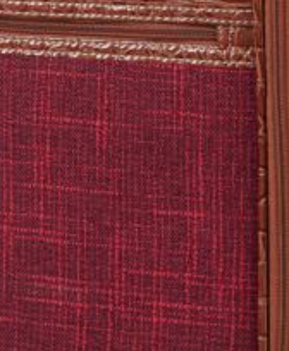 Close view of burgundy tweed on a Samantha Brown spinner
